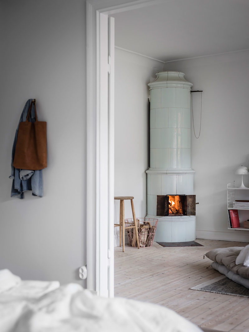 White apartment with an old stove
